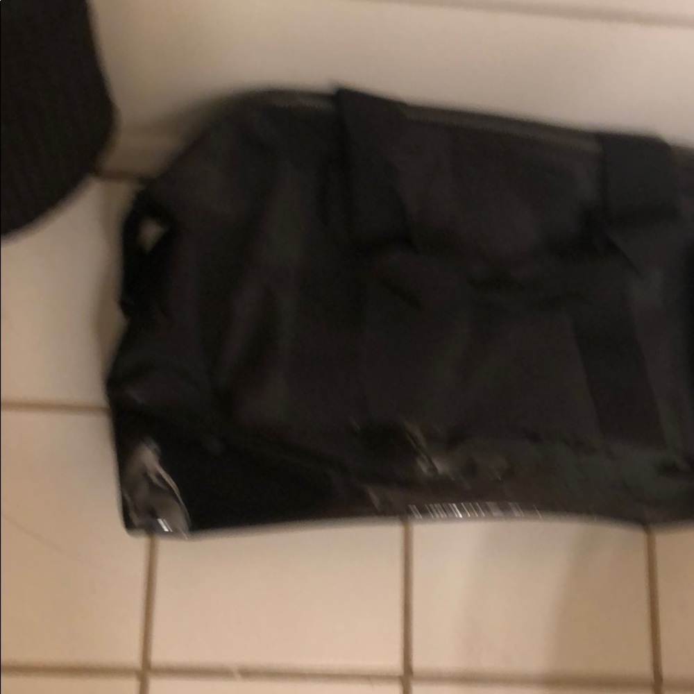 Blk duffel with patent leather